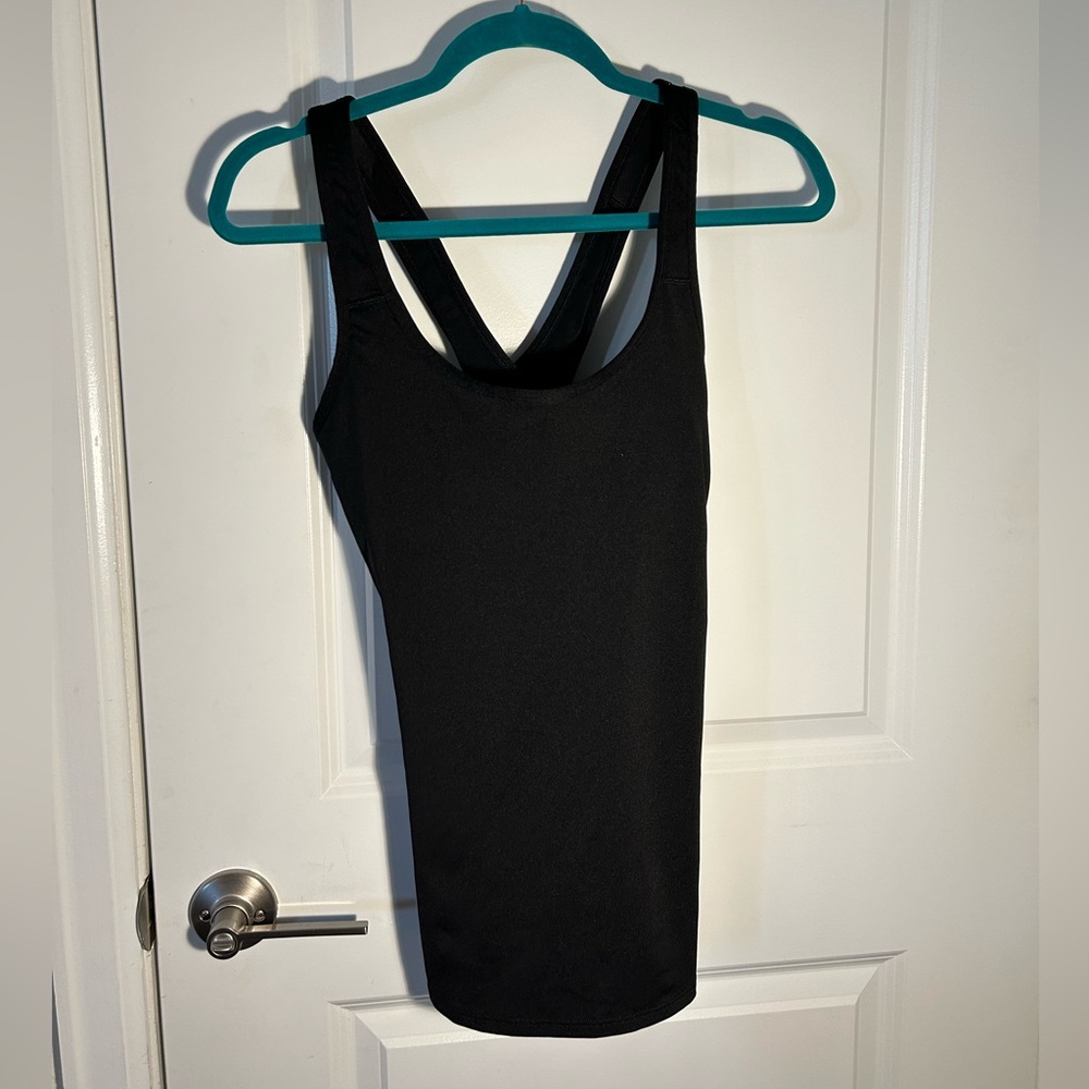 Black Athleta tank with criss cross back size medium